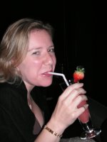 Ness sipping a
cocktail on the 45th floor jazz bar